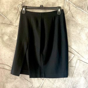 Bebe black skirt with front slit on the side